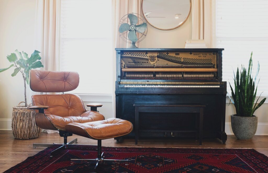 apartment living room with stylish high pile rug, measuring tape showing thickness