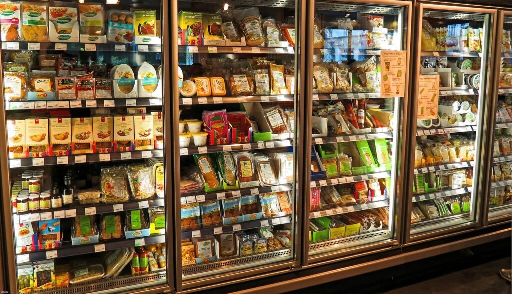 freezer shelves and food items removed and placed in cooler box