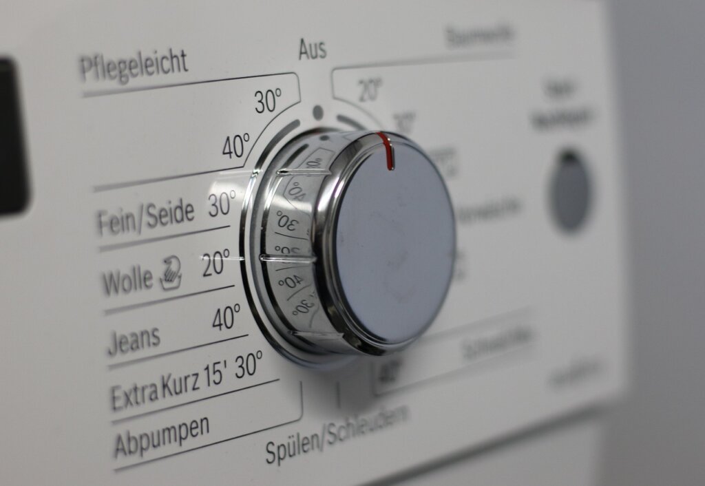 biofilm buildup on washing machine tub back panel