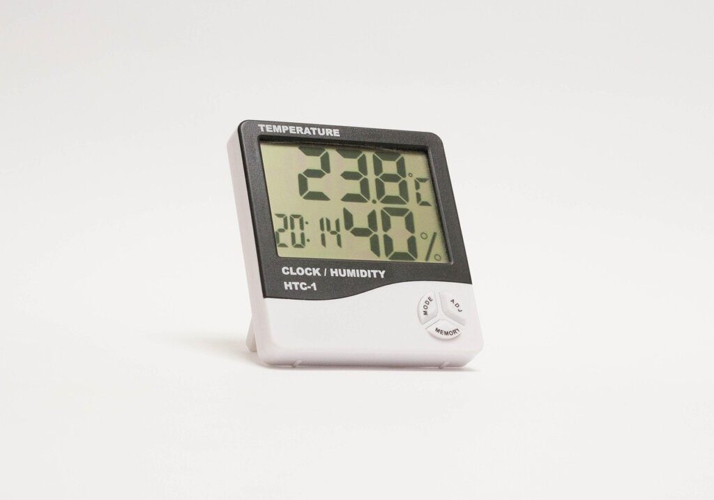 digital hygrometer placed in bathroom showing humidity level