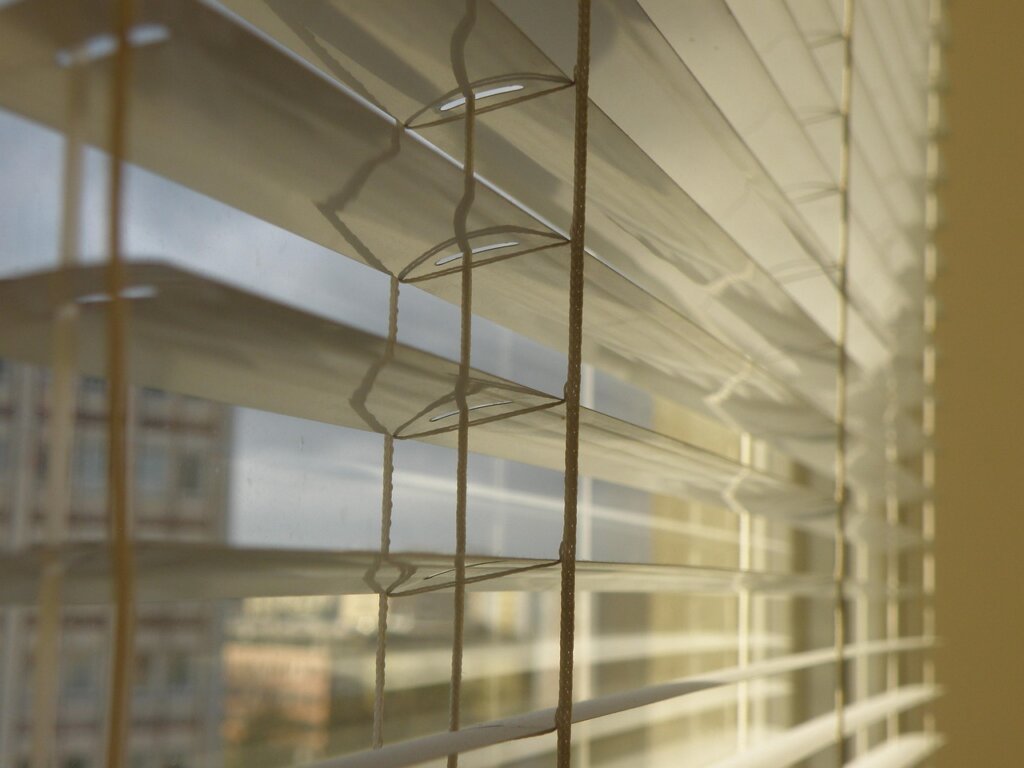 dusty window blinds closeup