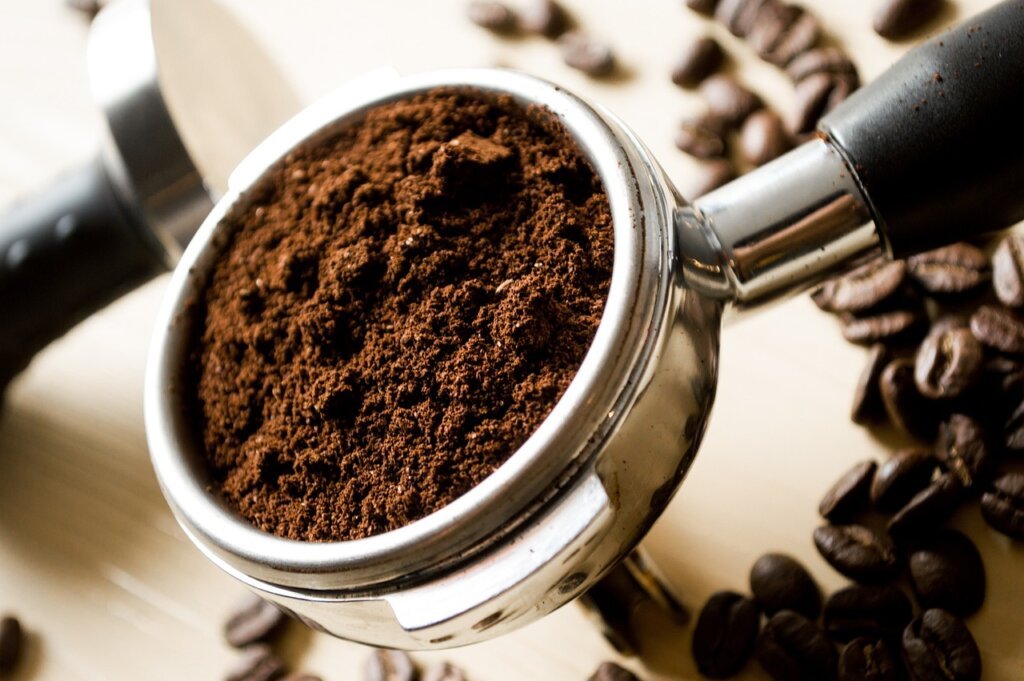 ground coffee in a small bowl inside microwave to absorb odors