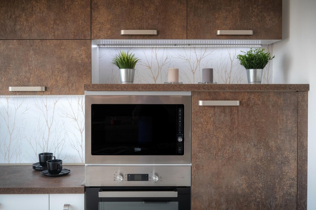 microwave oven interior with food stains and grease marks