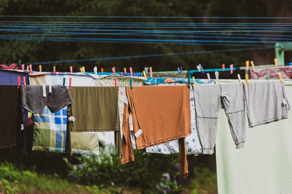 various fabric types laid out flat with laundry care labels visible