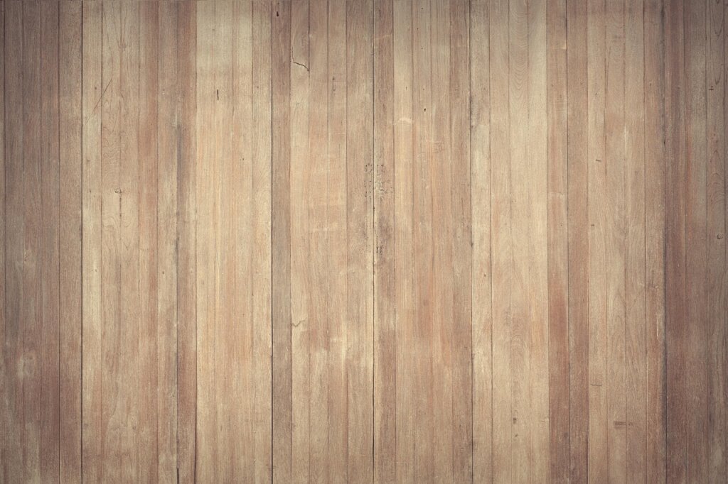 window screen mesh roll and spline rubber tool on wooden floor