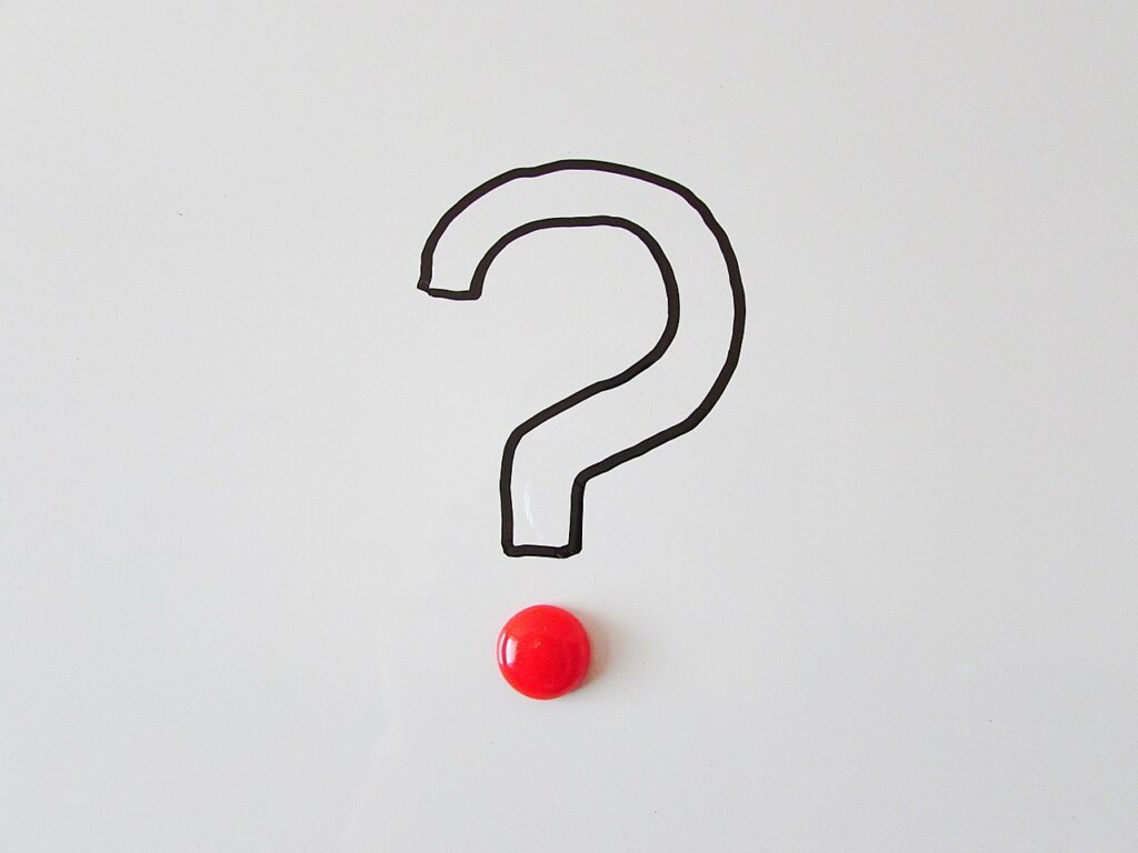 spray bottle being used in wardrobe with question mark overlay