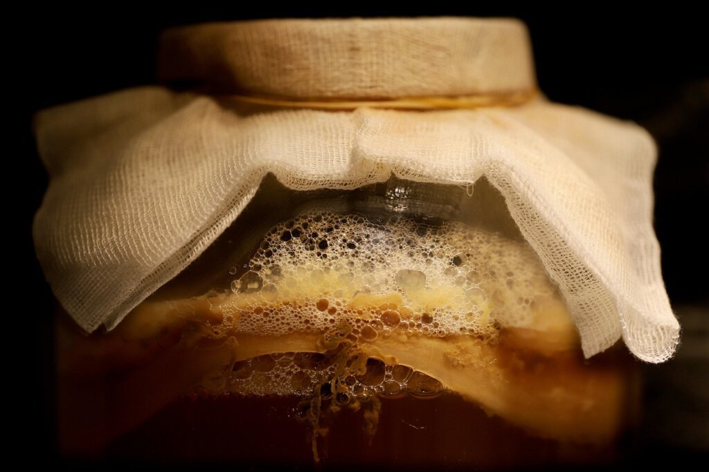 natto fermented soybeans in a bowl with chopsticks, natural lighting