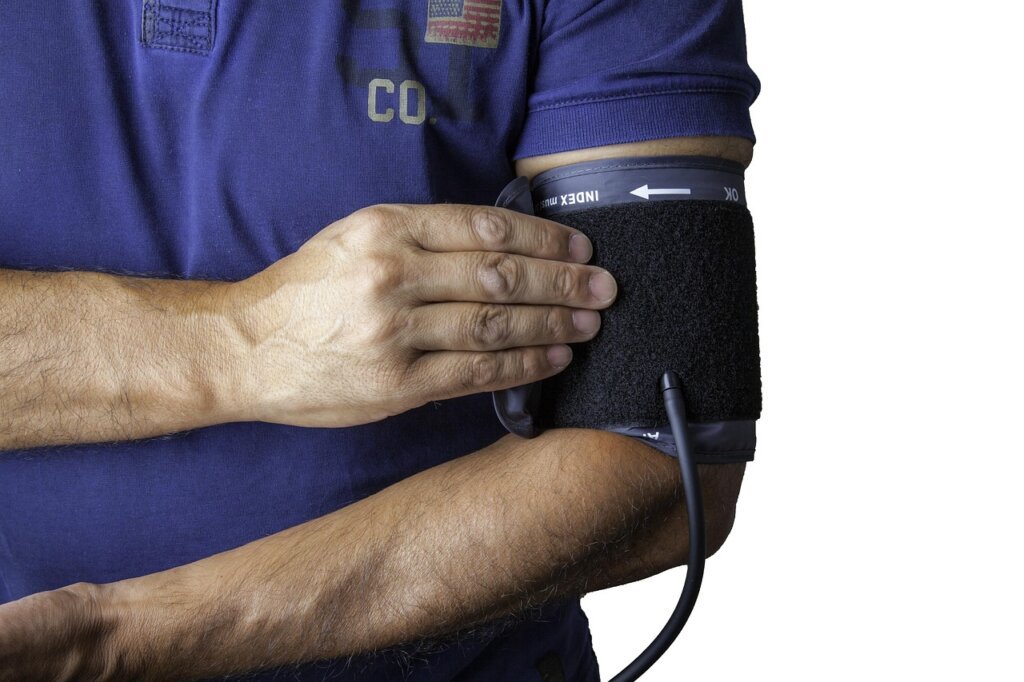 doctor reviewing patient supplement list before blood draw